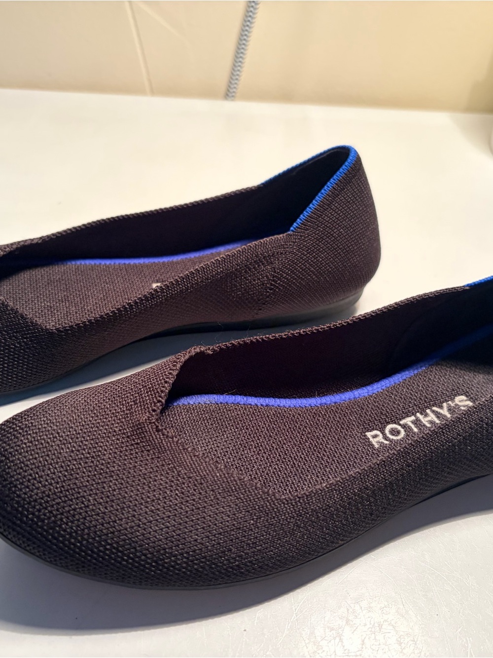 Rothy's Black Daily Knit Round-Toe Ballet Flat with Blue Trim